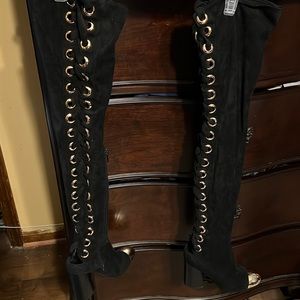 Thigh high black suede boots